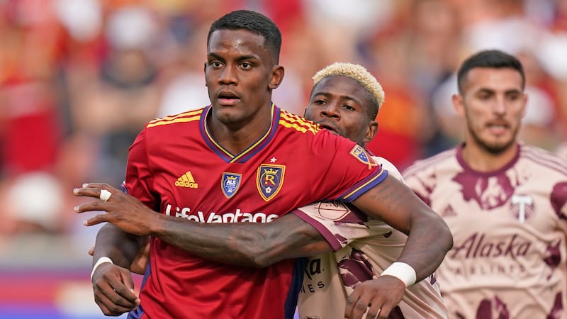 Portland Timbers forward Dairon Asprilla, right, defends against Real Salt Lake forward Sergio...