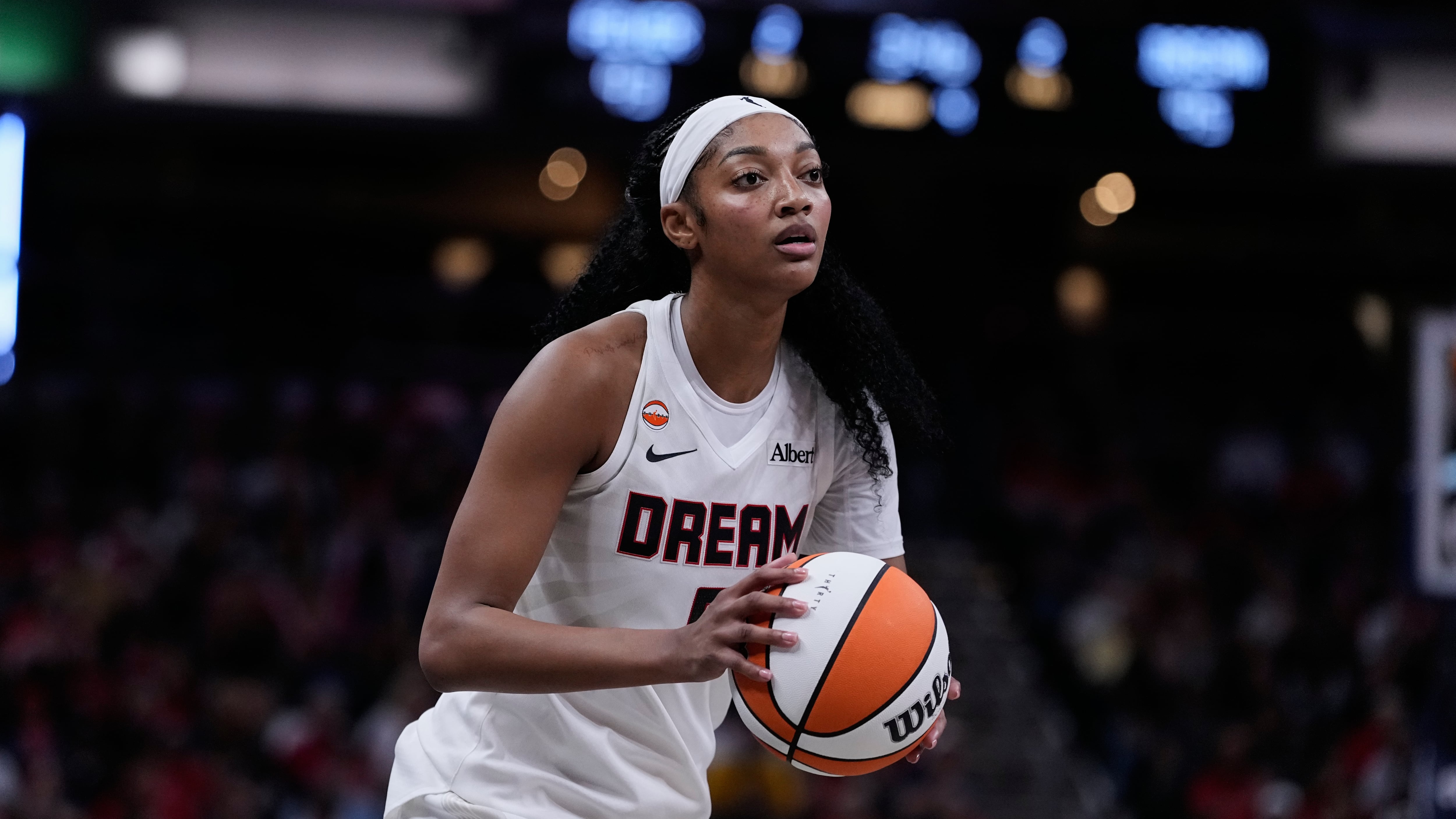Atlanta Dream forward Angel Reese (5) plays against the Indiana Fever in the second half of a WNBA basketball game in Indianapolis, Thursday, June 18, 2026. (AP Photo/Michael Conroy)