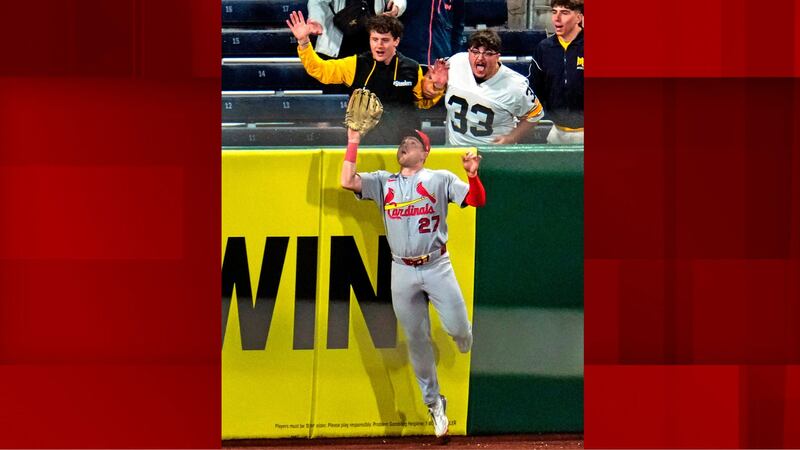 Cardinals Pirates Baseball St. Louis Cardinals left fielder Nathan Church (27) leaps to make...