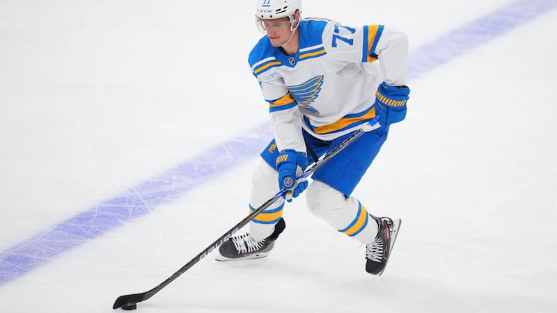 St. Louis Blues center Nick Bjugstad skates with the puck against the Dallas Stars during the...