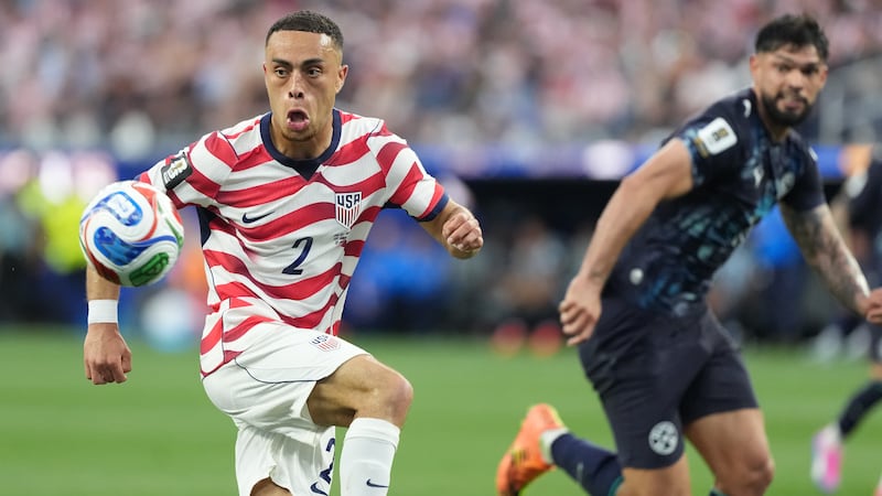 United States' Sergino Dest, left, controls a ball next to Paraguay's Omar Alderete during the...