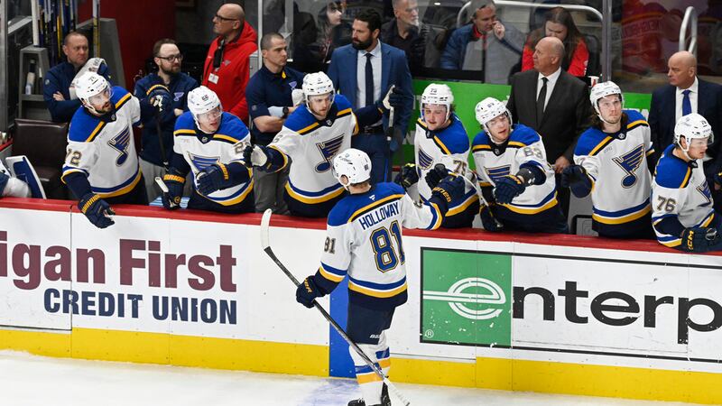 St. Louis Blues center Dylan Holloway (81) is congratulated after scoring a goal against the...