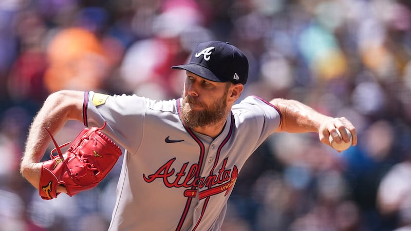 Atlanta Braves starting pitcher Chris Sale works against the Colorado Rockies in the fifth...