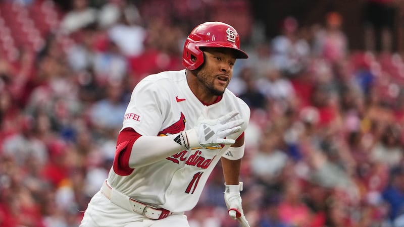 St. Louis Cardinals' Victor Scott II doubles during the second inning of a baseball game...