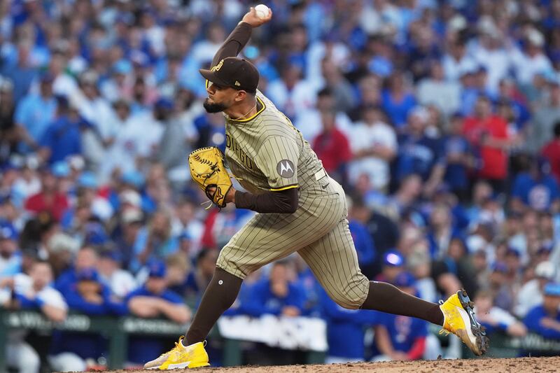 San Diego Padres' Robert Suarez throws the ball during the sixth inning of Game 3 of a National League wild card baseball game against the Chicago Cubs, Oct. 2, 2025, in Chicago. (AP Photo/Nam Huh, File)