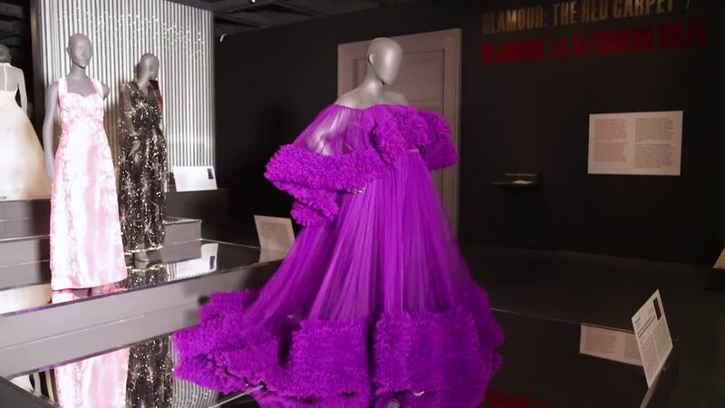 The “Fashioning America: Grit to Glamour” exhibit features vibrant works from some of the...
