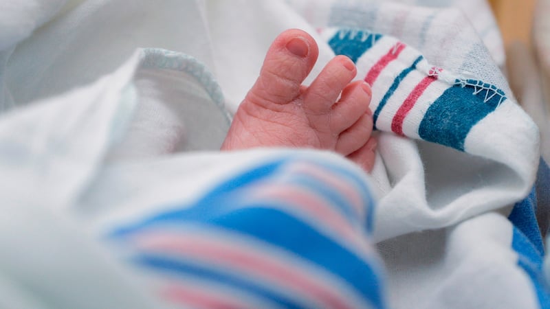 FILE - The toes of a baby are seen DHR Health, July 29, 2020, in McAllen, Texas.