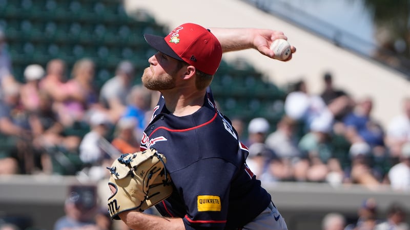 Atlanta Braves pitcher Bryce Elder throws against the Detroit Tigers in the first inning of a...