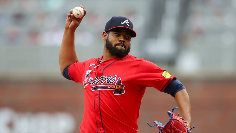 Atlanta Braves starting pitcher Reynaldo Lopez delivers in the first inning of a baseball game...