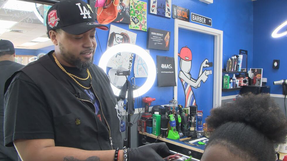 Justin Williams, the owner of No Mirrors Barber Studio