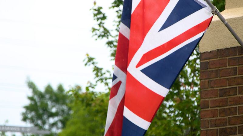 The Union Jack flies outside The Queen's Pantry, a British store in Marietta, GA.