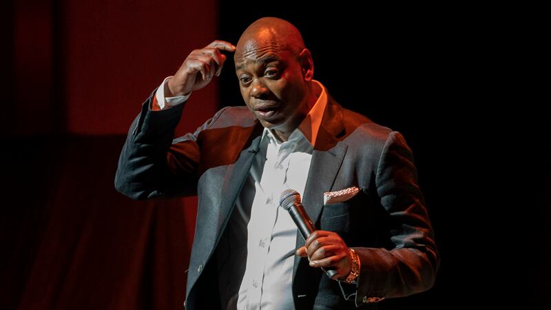 Dave Chappelle performs during a theater dedication ceremony honoring the comedian and actor,...