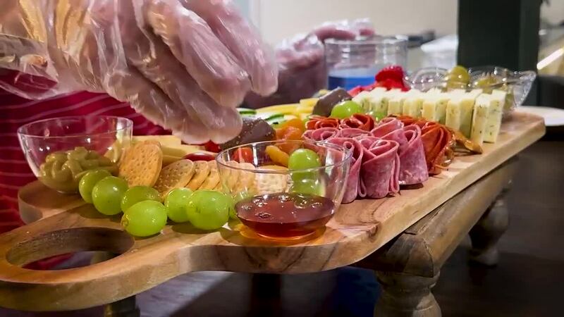 A charcuterie board at Grazefully Good being put together.