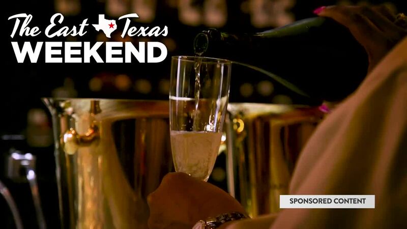 Serving a glass of wine, which you can enjoy at over 20 different wineries around East Texas.