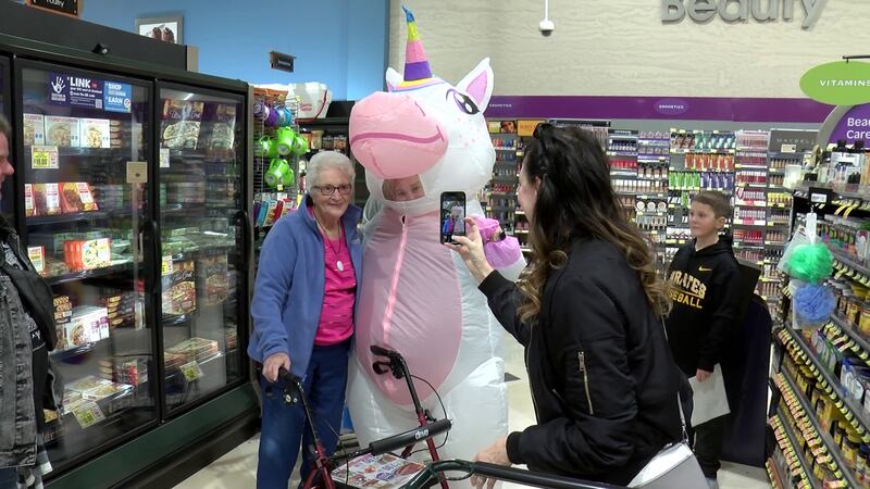 People laughed, smiled, and stopped to take selfies and pictures with Sarah.