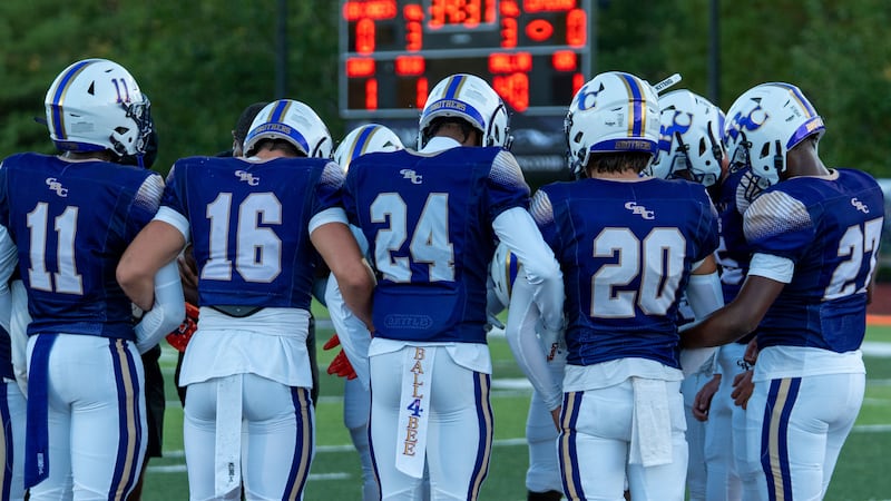 CBC football huddle.