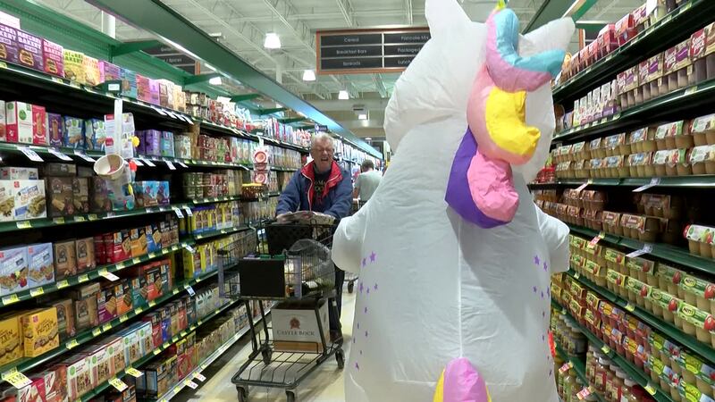 There was an unusual sight at a Harris Teeter in Fort Mill, as a local mom made good on a recent promise to go grocery shopping in a blow-up unicorn costume.