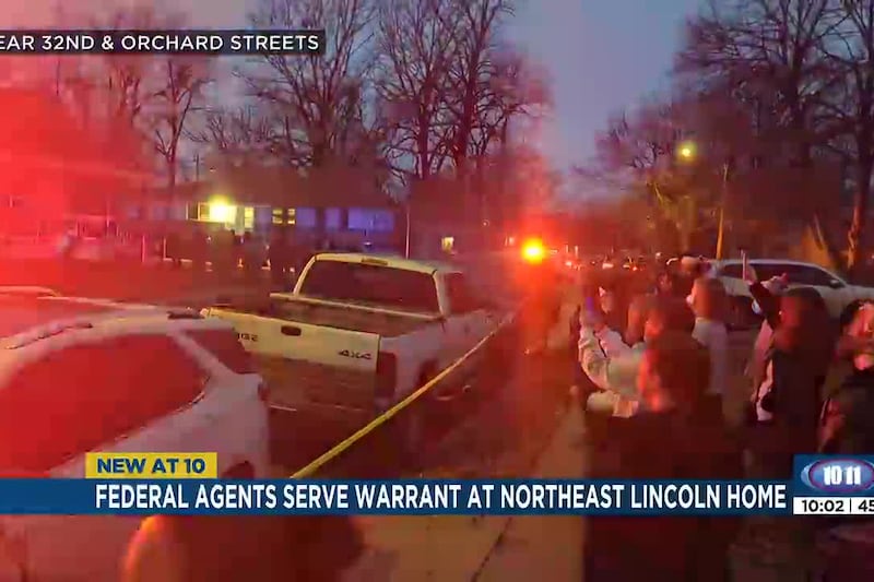 Federal agents serve warrant at northeast Lincoln residence, sparking outrage from bystanders