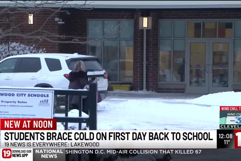 Lakewood students, parents brave cold to return to school