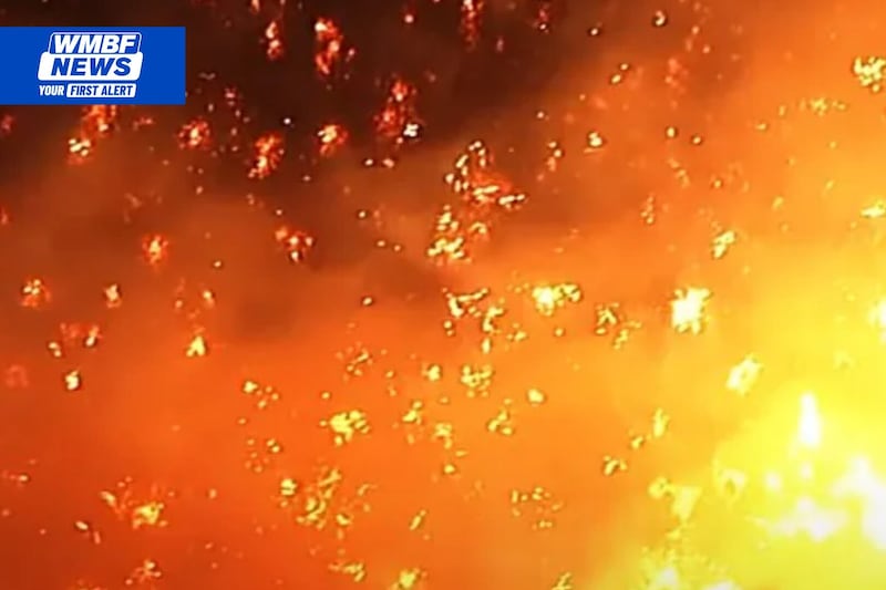 West Florence fire crews respond to outdoor fire threatening nearby home