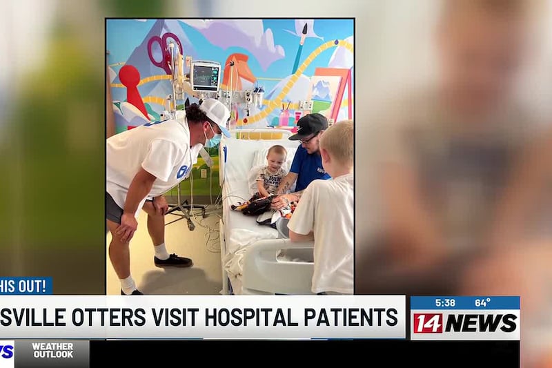 Evansville Otters visit patients at children's hospital