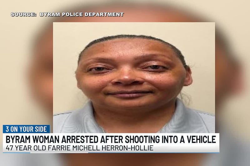Byram woman arrested after shooting into a vehicle, police say