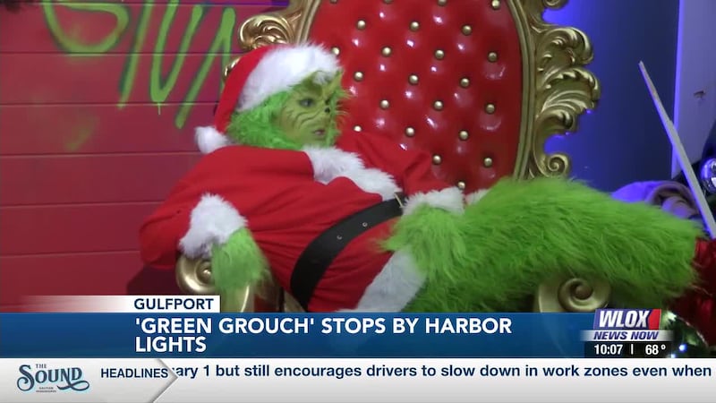 Families could not tell what the Green Grouch might do. Like the kids, adults found it...