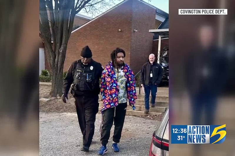 Man charged with murder after woman found unconscious in yard